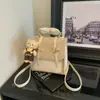 Mochila casual estilo británico transfronteriza, bolso de mano de moda para mujer, mochila pequeña de viaje de nicho estilo coreano para estudiante