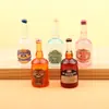 Botella de vino pequeña miniatura llavero colgante hecho a mano DIY funda para teléfono móvil material de juego de alimentos accesorios de resina casa de muñecas do11