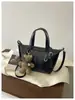 Bolso de hombro individual de temperamento simple para ir al trabajo Bolso de mano versátil de nuevo estilo transfronterizo Bolso tipo cubo Bolso cruzado casual retro Maillard