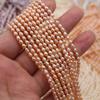 Fabricantes de fuentes venden al por mayor una gran cantidad de perlas de agua dulce cultivadas naturales Perlas pequeñas en forma de arroz DIY Perlas de arroz pequeñas de 2-3 mm