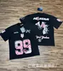 Nueva Camiseta de Manga Corta Hells 2026 Lavada Vintage Desgastada Estampado Completo Graffiti Marca de Moda Estilo Verano Unisex