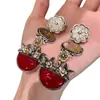 Pendientes de Resina con Incrustaciones de Flores Nuevos de Otoño e Invierno Pendientes de Pétalos Metálicos de Cristal Estilo Étnico Europeo y Americano Pendientes Retro