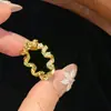 Moderna Lujo Ligero Viajero Clásico Exquisito Temperamento Diamante Completo Cordón de Teléfono Diseño de Anillo Envolvente Anillo de Zirconia para Mujer