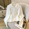 Cárdigan de punto con solapa y bordado floral de estilo suave para mujer, nuevo abrigo de otoño e invierno de alta gama con cuello de muñeca