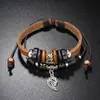 Pulseira estilo punk de venda quente transfronteiriça multicamadas feita à mão com contas ajustável para homens e mulheres pulseira de couro de vaca personalidade estilo europeu e americano mão