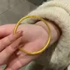 El círculo Nezha Gankun hereda el antiguo círculo Fa Su Bauhinia patrón rollo pulsera sólida corte