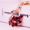 Joyas de cristal pedrería cisne blanco llavero de coche accesorios para bolso de mujer llavero colgante de metal pequeño regalo 1137
