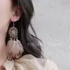 Aretes de Estilo Exótico de Venta Caliente Retro Literario Clásico Dignificado Ganchos para la Oreja Versátil Hueco Moda Borla Colgantes