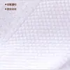 Conjunto de toalhas de algodão puro acetinado platina, incluindo três peças: toalha de banho, toalha de mão e toalha de rosto. Qualidade de ponta, adequada para hotéis, salões de beleza e saunas. Venda por atacado disponível diretamente do fabricante
