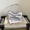 Moda transfronteriza simple para el día a día 2026 verano nuevo bolso de mano con lazo bolso de hombro bolso personalizado bolso de axila