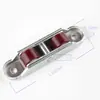 Fabricantes fornecem 88 polias de porta e janela de plástico de nylon autoajustáveis de aço com estrutura externa de liga de zinco espessada com base plana ajustável de polia dupla