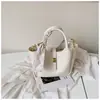 Bolsa tote de seda nueva y elegante para comercio exterior al por mayor, bolsa para mujer, estilo coreano, bolso cubo retro de nicho, bolso de hombro, bolso cruzado