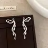 Pendientes Elegantes de Lazo con Baño de Oro Real con Borlas de Gama Alta Diseño Súper de Hada Pendientes de Moda Elegantes de Nicho para Mujer