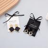 Transfronterizo Corea del Sur Algodón Negro Joyería Aretes Embalaje Tela Moda Aretes Aretes Especiales Embalaje Collar Joyería