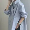 Moda Coreana de Alta Gama Dongdaemun para Mujer Colección Primavera 2026 Camisa con Abertura Lateral Irregular y Botón Diagonal Nuevo Estilo de Primavera para Mujer