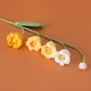 Campanillas de viento de flor de lirio de color degradado tejidas a crochet con lana ramas de flores elegante sala de té aula de guzheng decoración de escritorio