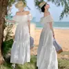 Vestido de Vacaciones Bordado Hueco Estilo Francés Hombros Descubiertos Vestido Largo Blanco
