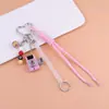 Serie Miu Llavero Colgante de Cámara Colorido Hebilla en Forma de Corazón Decoración de Dados Cuerda Trenzada Colgante Creativo Personalizado para Bolso