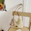 Bolso tejido calado artístico transfronterizo para mujer, nuevo modelo verano 2026, bolso de hombro para axila de gran capacidad, bolso de playa para vacaciones