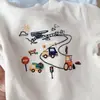 Camiseta de manga larga para niño, nuevo modelo 2026, top de otoño para poner sin botones para bebés y niños pequeños, ropa infantil de alta calidad
