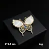 Broche de concha imitação de diamante nicho pino de pérola anti-luz pino de broche de liga em estoque acessórios de vestuário atacado