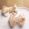 Nuevos accesorios acrílicos con lazo floral de verano, accesorios de bricolaje, horquillas, accesorios para el cabello, fundas de teléfono para mujer, venta al por mayor