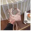 Nueva colección de verano 2026: bolso de hombro pequeño, bolso cruzado y bolso de mano elegantes y chic con diseño en forma de nube para mujer