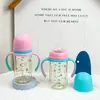 Nueva mamila de PC de boca ancha anticólicos con asa para bebés de 0 a 6 meses, empaquetada en una caja de color
