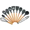 Venta al por mayor de fábrica Amazon Juego de utensilios de cocina de silicona con mango de madera Juego de 11 piezas Utensilios de cocina Olla para cocinar Pala Cuchara