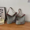 Diseño de Nicho Versátil Transfronterizo Verano 2026 Nuevo Exquisito Moda para Viajes Diarios Bolso Tote de Hombro Cruzado de Alta Gama