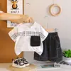 Conjunto de Verano para Niños 2026 Nuevo Bolsillo Manga Corta Elegante para Bebé Conjunto de Dos Piezas Delgado de Cuello Redondo Moderno