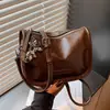 Bolso de hombro de moda versátil para mujer de verano 2026 transfronterizo, bolso cruzado popular, bolso cuadrado pequeño versátil para salir