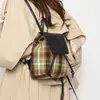 Bolso de diseño nicho 2023 nueva mochila para mujer bolso cubo portátil casual para combinar con todo de alto sentido mochila para salir