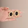 Pendientes Metálicos Ovalados Asimétricos Estilo Medieval Exagerados Retro Estilo Europeo y Americano Popular Disco de Espiral para Mosquitos Sin Perforación Clip para Oreja para Mujeres