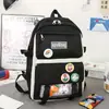 Mochila escolar para estudiantes de cuatro o cinco piezas, mochila para estudiante de primaria femenina, mochila de lona, mochila para niño, moderna, rábano, conejito