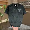 2026 Verano Nuevo Diseño Estampado Casual Americano Deportivo para Hombre Cuello Redondo Manga Corta Camiseta Versátil Parte Superior Manga Corta