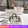 Entrega em uma peça bolsa almofada Boston nicho 2024 nova popular bolsa de mão de alta qualidade atacado