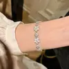 Lujo Ligero y Gama Alta Retro Incrustaciones Flor de Diamante Burbuja Completamente Diamantado Pulsera Pendientes Versátil Para el Trabajo Elegante Exquisito Conjunto
