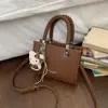 Elegante Bolso de Mano Xiaomi para Mujer 2026 Otoño Nuevo de Alto Valor Retro Bolso de Hombro Cruzado Pequeño Bolso Tote de Trabajo