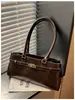2026 Bolsa Casual Retro de Axila Feminina 2026 Verão Nova Moda Bolsa de Ombro Único Tendência Casual Bolsa Feminina