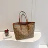 Bolso de mujer de gran capacidad 2026 nuevo diseño de moda, bolso de cubo de un solo hombro, bolso tote con textura impresa elegante para el día a día, bolso grande