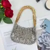 Bolso de cadena de metal exagerado transfronterizo europeo y americano, bolso tejido de axila de color oro y plata empalmado, bolso de mano de noche estilo punk de alta resistencia