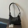 Bolso de axila de diseño nicho coreano para mujer, nuevo bolso versátil tipo dumpling de alta gama, bolso de mano y bolso de hombro