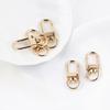 Accesorios de joyería hechos a mano, hechos a mano, galvanizados, en forma de U, oro K, blanco K, bolso de moda, llavero, colgante de joyería