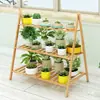 Estante de flores para balcón multicapa para interiores plegable de pie para macetas de flores suculentas planta araña sala de estar madera no maciza estante de almacenamiento simple