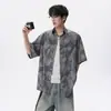 Camisa tie-dye casual trendy de rua estilo americano de manga curta para homens e mulheres, camiseta casual solta de alta qualidade para o verão