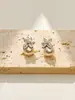 Pendientes de botón de flor y perla versátiles de moda Diseño de nicho Estilo de lujo ligero Pendientes de moda