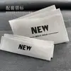 Etiqueta de ropa tarjeta pegamento flexible transparente papel especial listado LOGO ropa de mujer etiqueta personalizada diseño gratuito