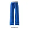 Otoño 2026 Nuevo Estilo Blanco con Patrón de Escamas de Dragón en Contraste Pantalones Largos Ligeramente Acampanados M-5XL HK261093-TeP26