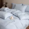 Estilo de lujo ligero juego de cuatro piezas de bordado jacquard 100% algodón puro funda nórdica de algodón de fibra larga sábana bajera ropa de cama para dormitorio principal